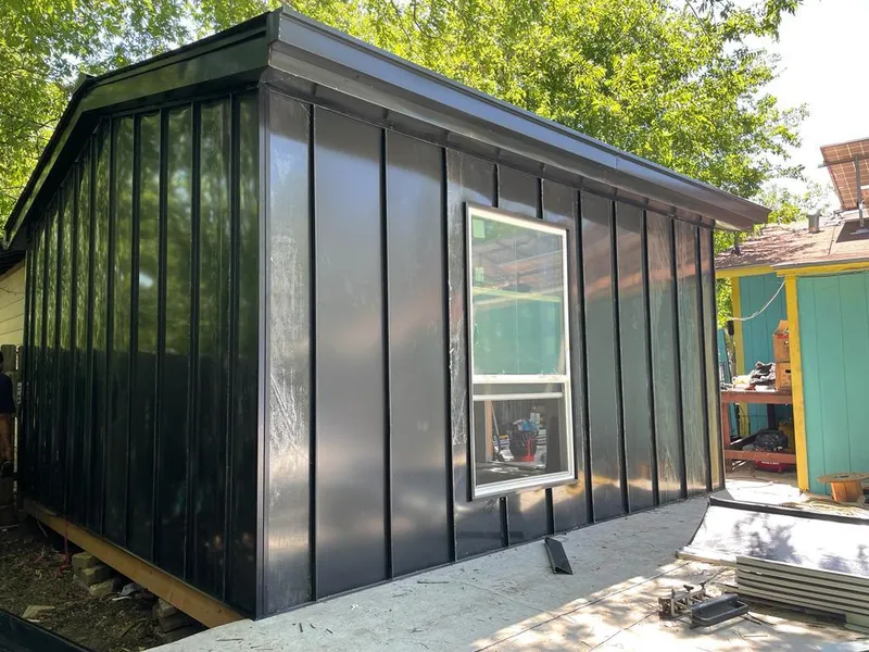 Black standing seam metal wall panels for Metal Roof Installation in Greensburg